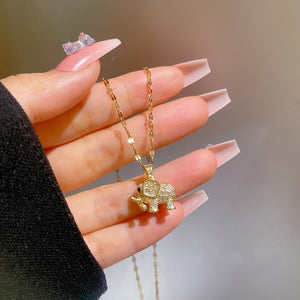 Chic Golden Elephant Pendant Necklace with Sparkling Cubic Zirconia - Elegant Titanium Steel Collarbone Chain for Women, Perfect Gift for Va