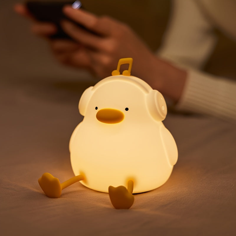 Happy Duck Enjoy Duck Silicone Night Light Is a Smart Patting Light That Is USB Rechargeable, Perfect for Bedside Use. It Features Touch Sensitivity, Adjustable Brightness in Three Levels, And a Timer, Making It an Ideal Decorative Lamp for Rooms. This Cu